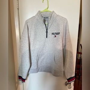 Tommy L size sweater. Brand new